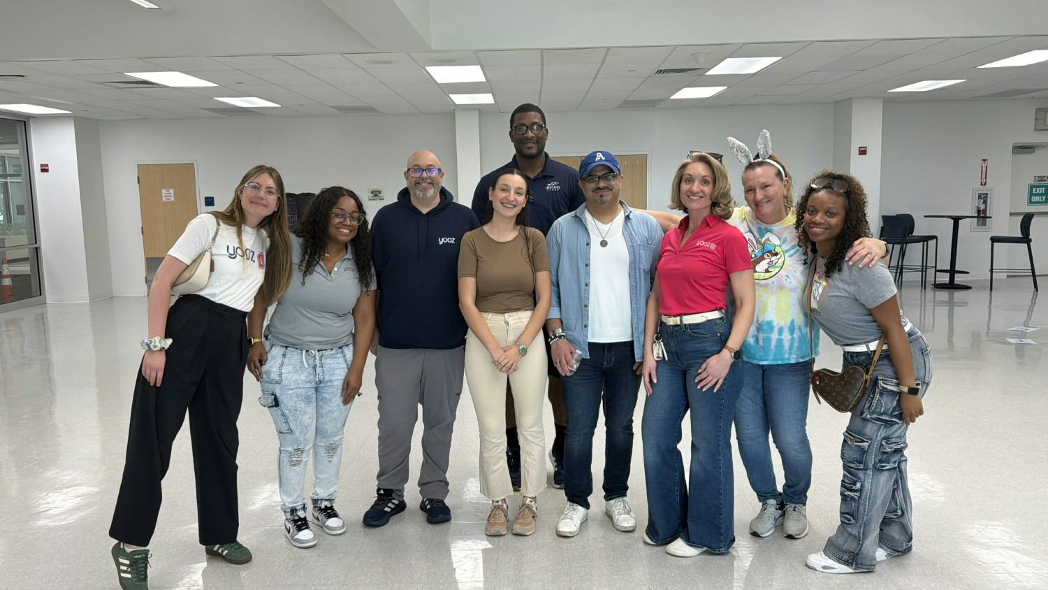 Yooz Inc employees volunteered at a local youth center, creating meaningful moments through fun activities