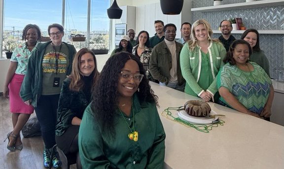 Yooz Inc. employees wearing green and celebrating Saint Patrick Day