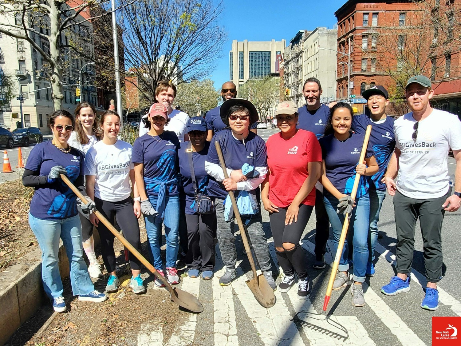 Employees from Equitable and AllianceBernstein partnered with NY Cares to complete a mall cleanup in Harlem.
