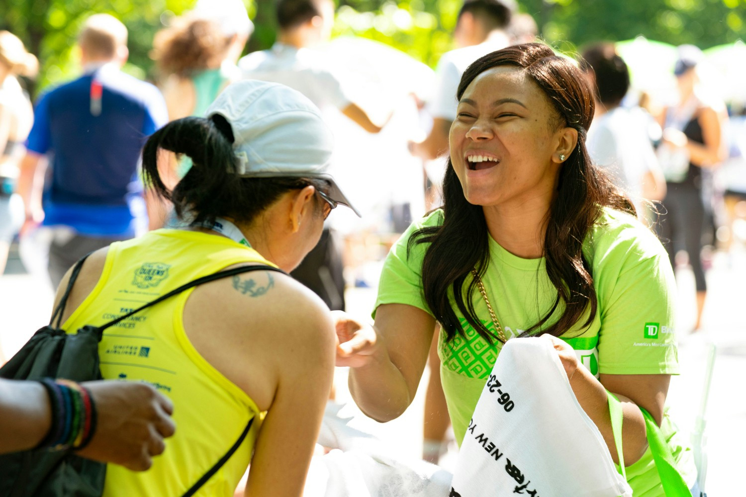 Colleagues celebrate disability inclusion during the 22nd Annual Achilles Hope & Possibility 4M presented by TD Bank.