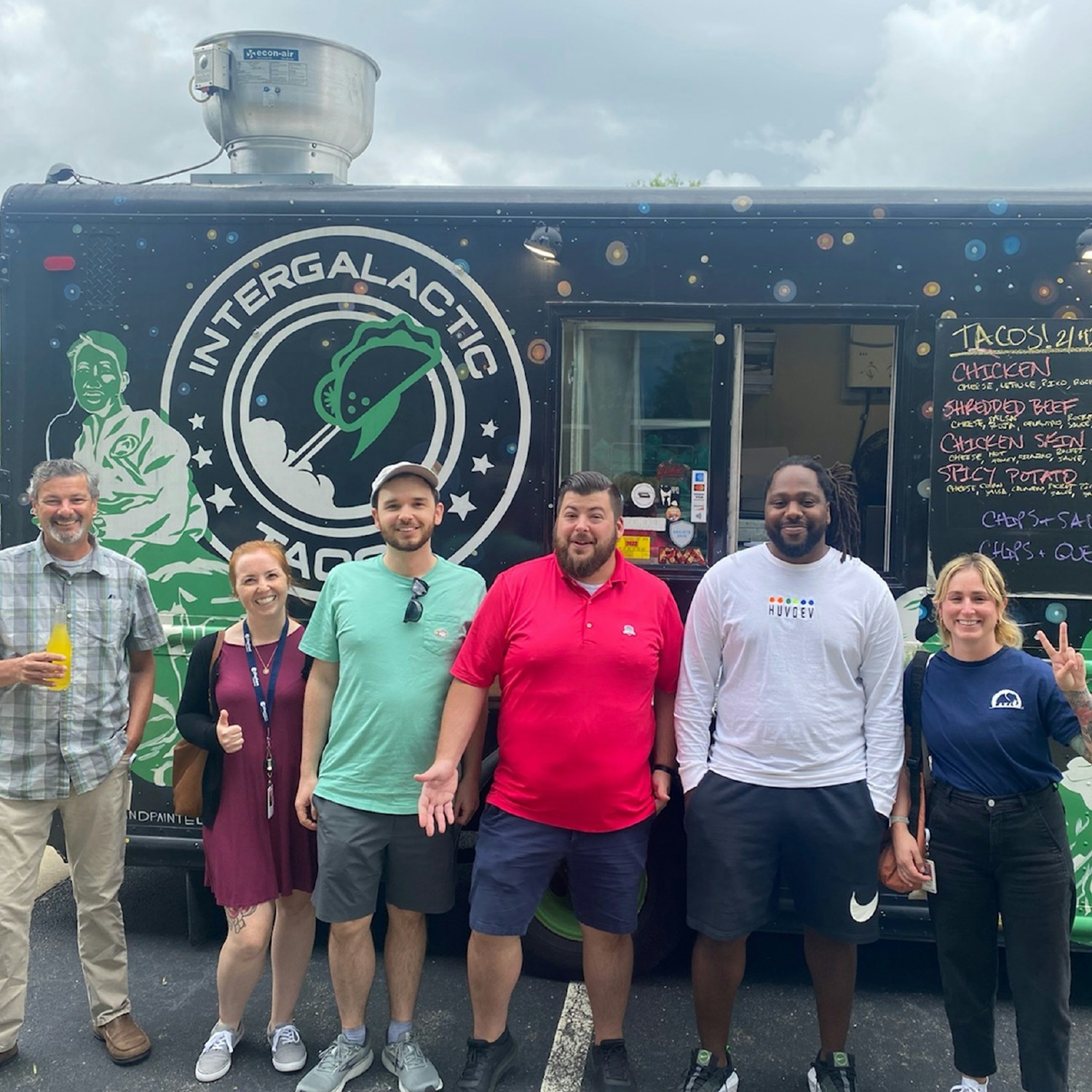 Aug 22: A group of employees during our company-wide Connected Days! Enjoying a food truck covered by Elephant.