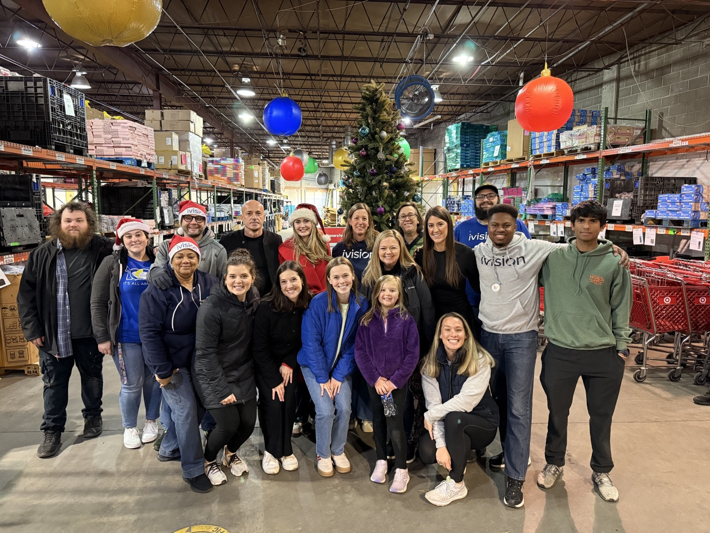 Team members volunteer at the Atlanta Empty Stocking Fund during the holidays. 