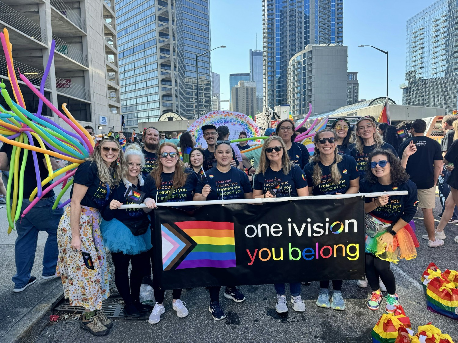 Team members represent ivision at the Atlanta Pride parade to share a message of belonging to the community.