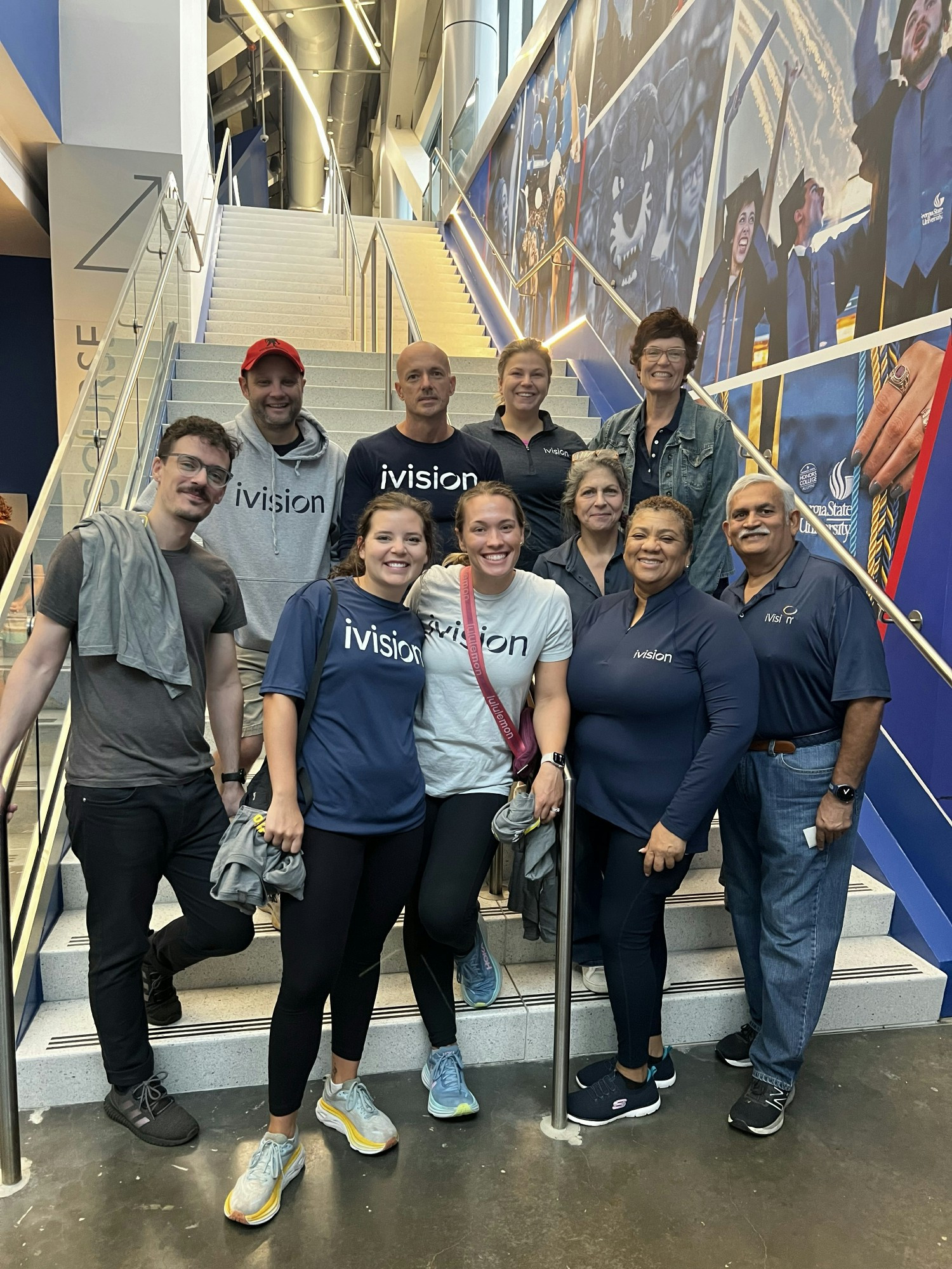 Team members volunteer at the largest meal pack event to organize over 10,000 meals.