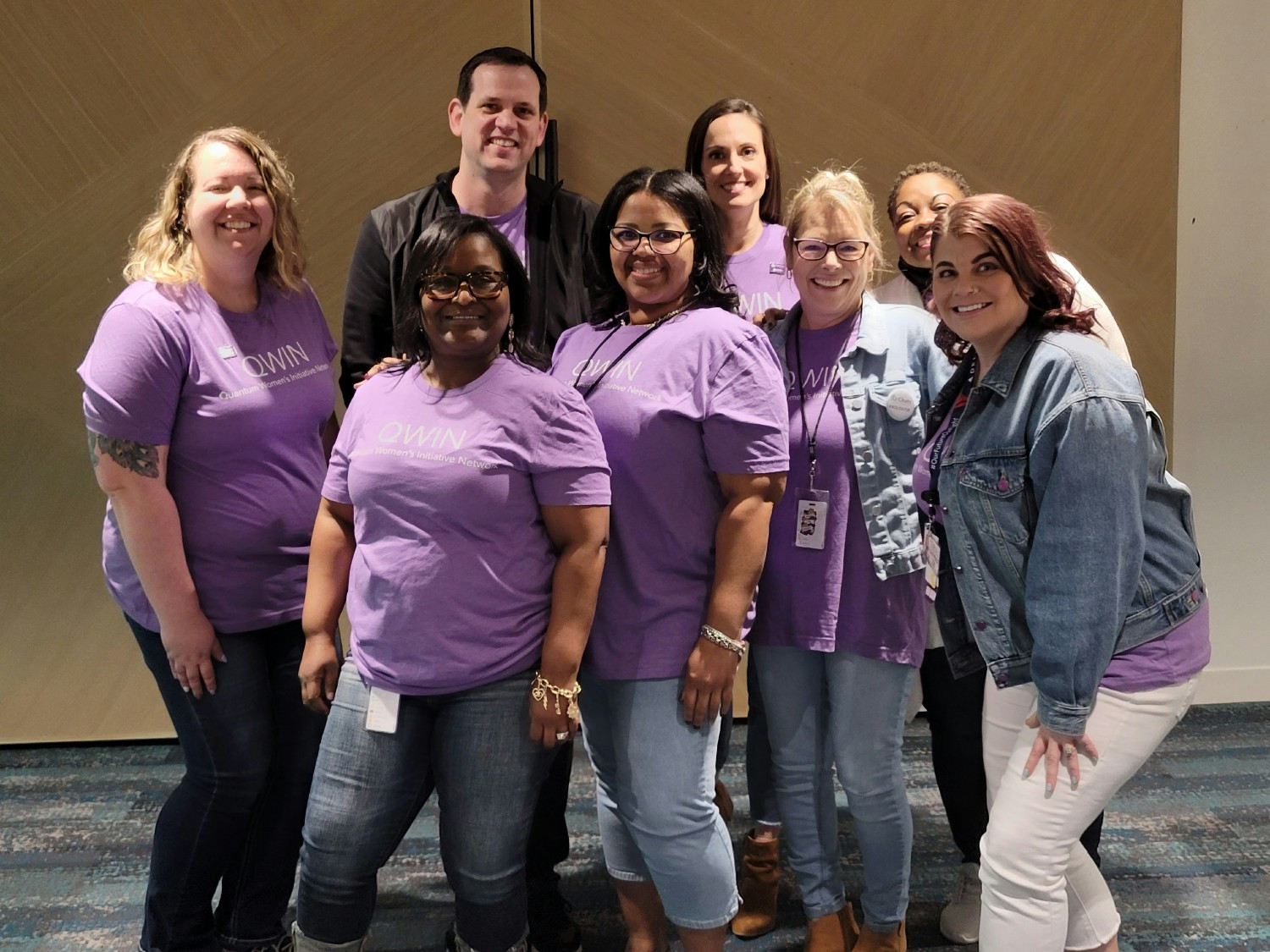 Members of our Quantum Women's Initiative Network ERG, alongside their executive sponsor and president, Shannon.