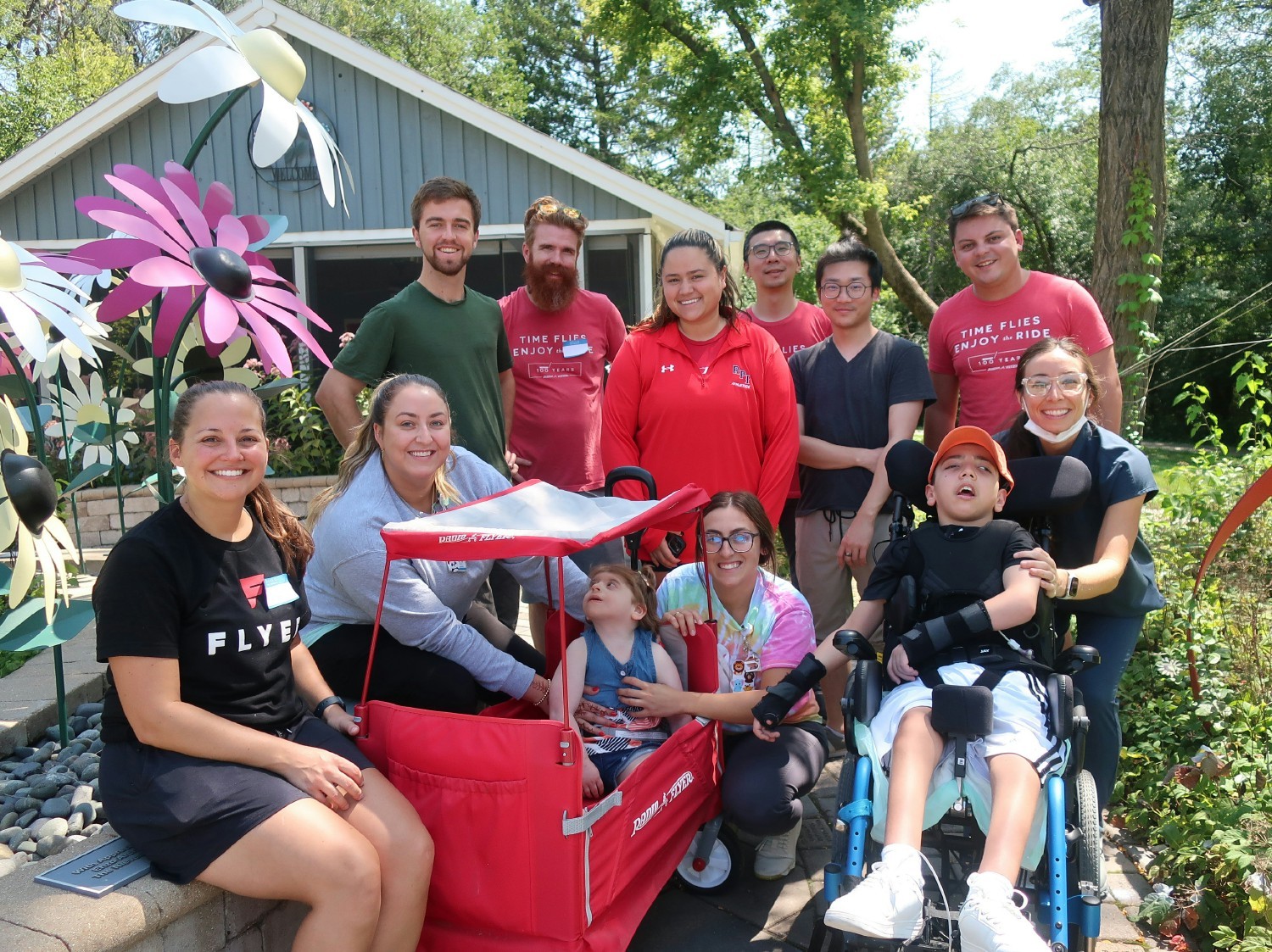 Radio Flyer gives back at a Smile Day with longtime partner Almost Home Kids, organized by the Smile Squad Committee.