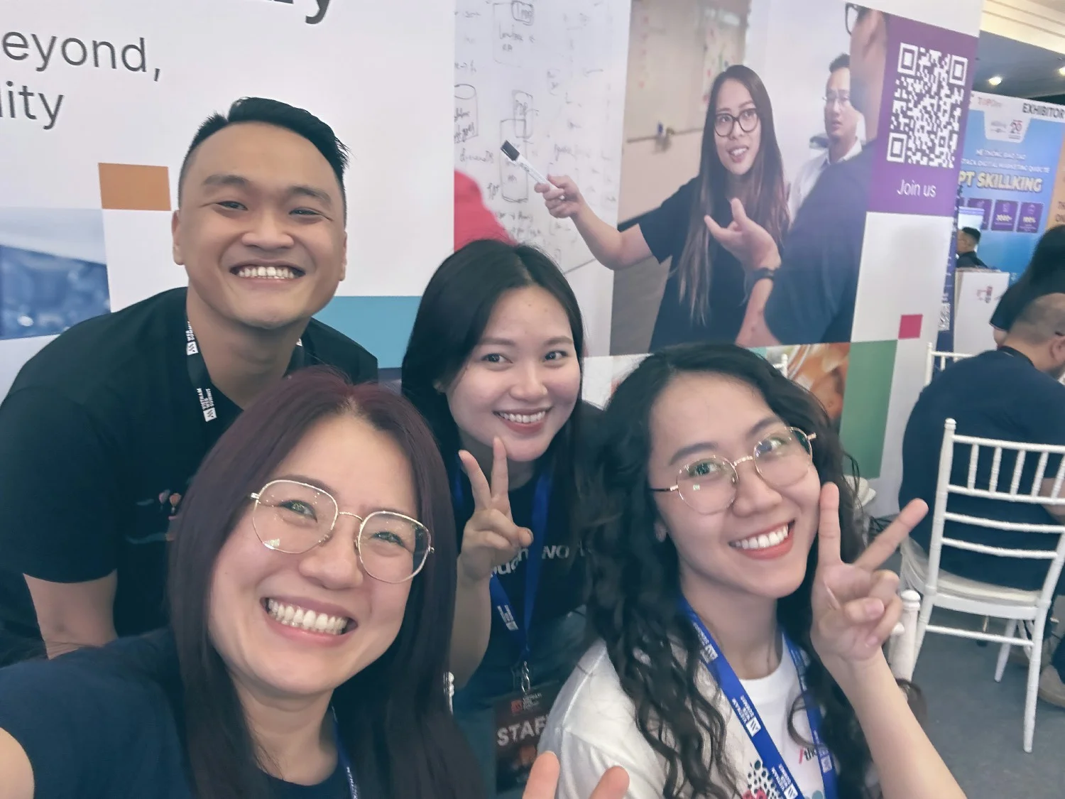 Thoughtworkers taking a selfie break at a local event.