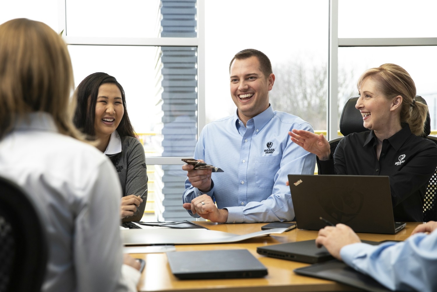 A candid shot during a sales meeting discussing finish options.