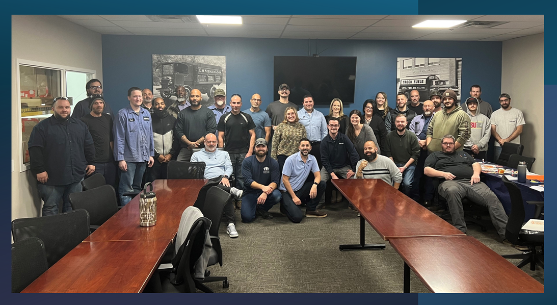 Our Maple Shade upfit team at a monthly engagement meeting for business updates and team bonding.