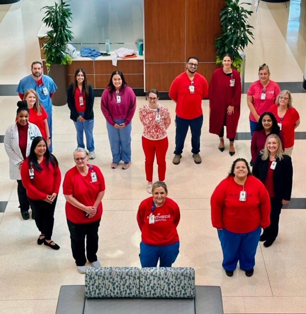 Our Northside employees forming a heart and celebrating National Wear Red Day to raise awareness for heart disease.
