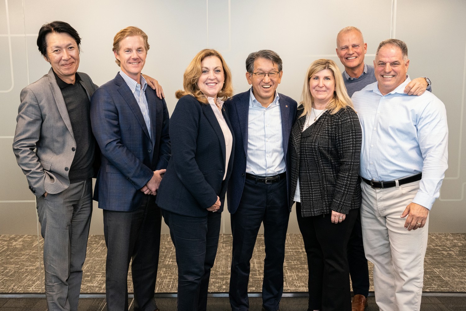 Members of the Ricoh Executive Management Team welcome global Chairman, Jake Yamashita, to Ricoh U.S. offices