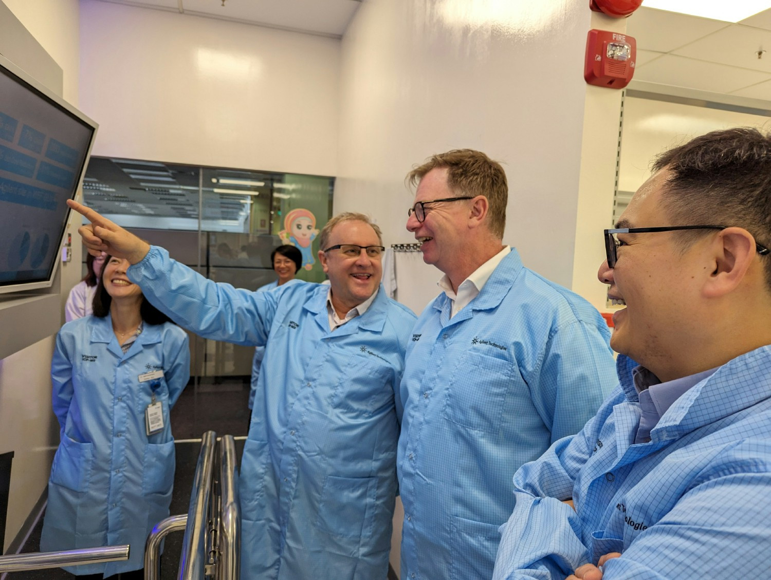 Retired CEO Mike McMullen, current CEO Padraig McDonnell, tour of Agilent’s manufacturing facility, Singapore, April '24