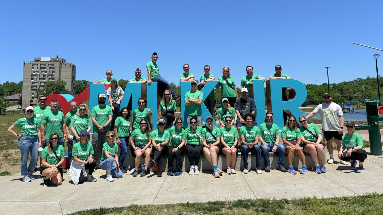 Associates together cleaning parks to Make Every Block Better.