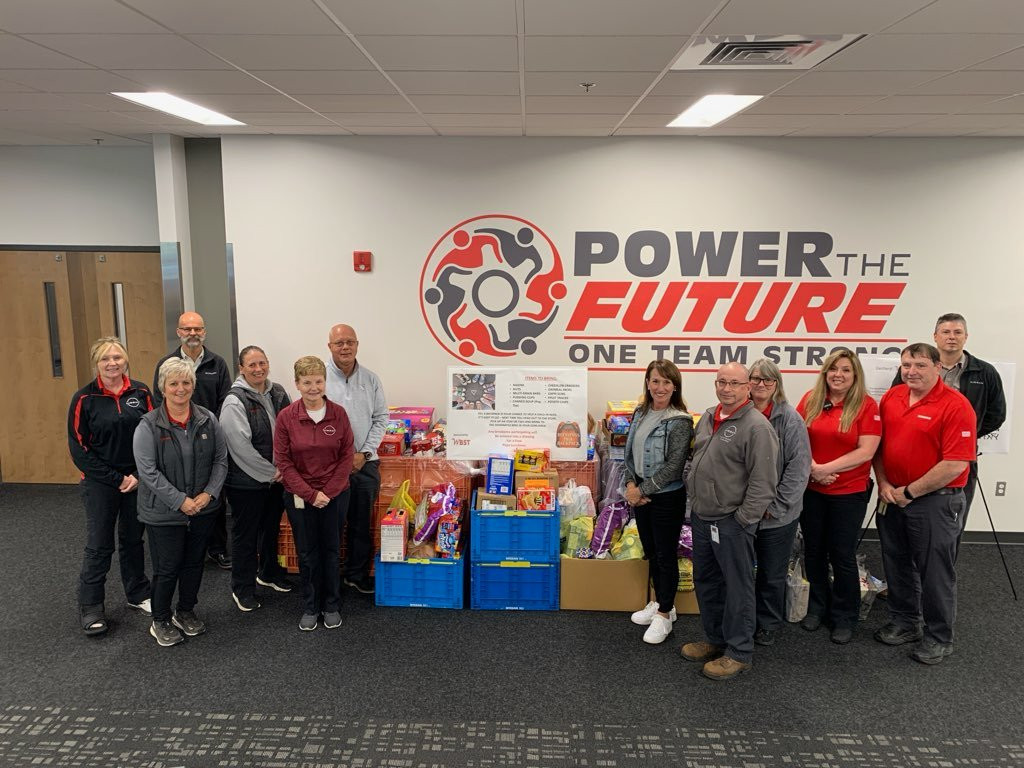 Nissan employees gathered to give vibrant educational supplies for charity.