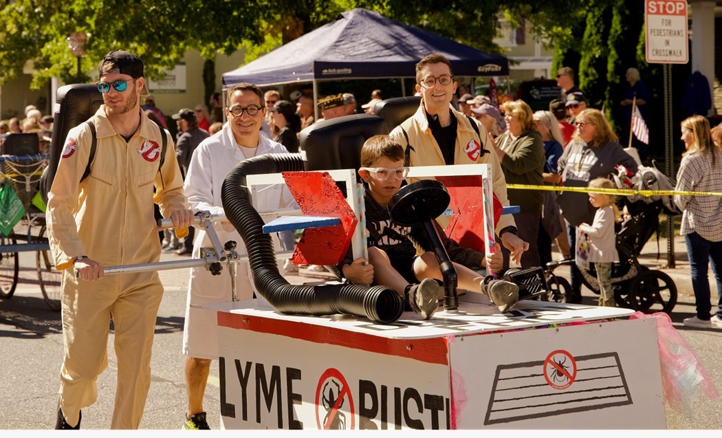 Physicians pushing our bed during the annual Bed Race in Milford, NJ - the bed's theme this year was Lyme Busters