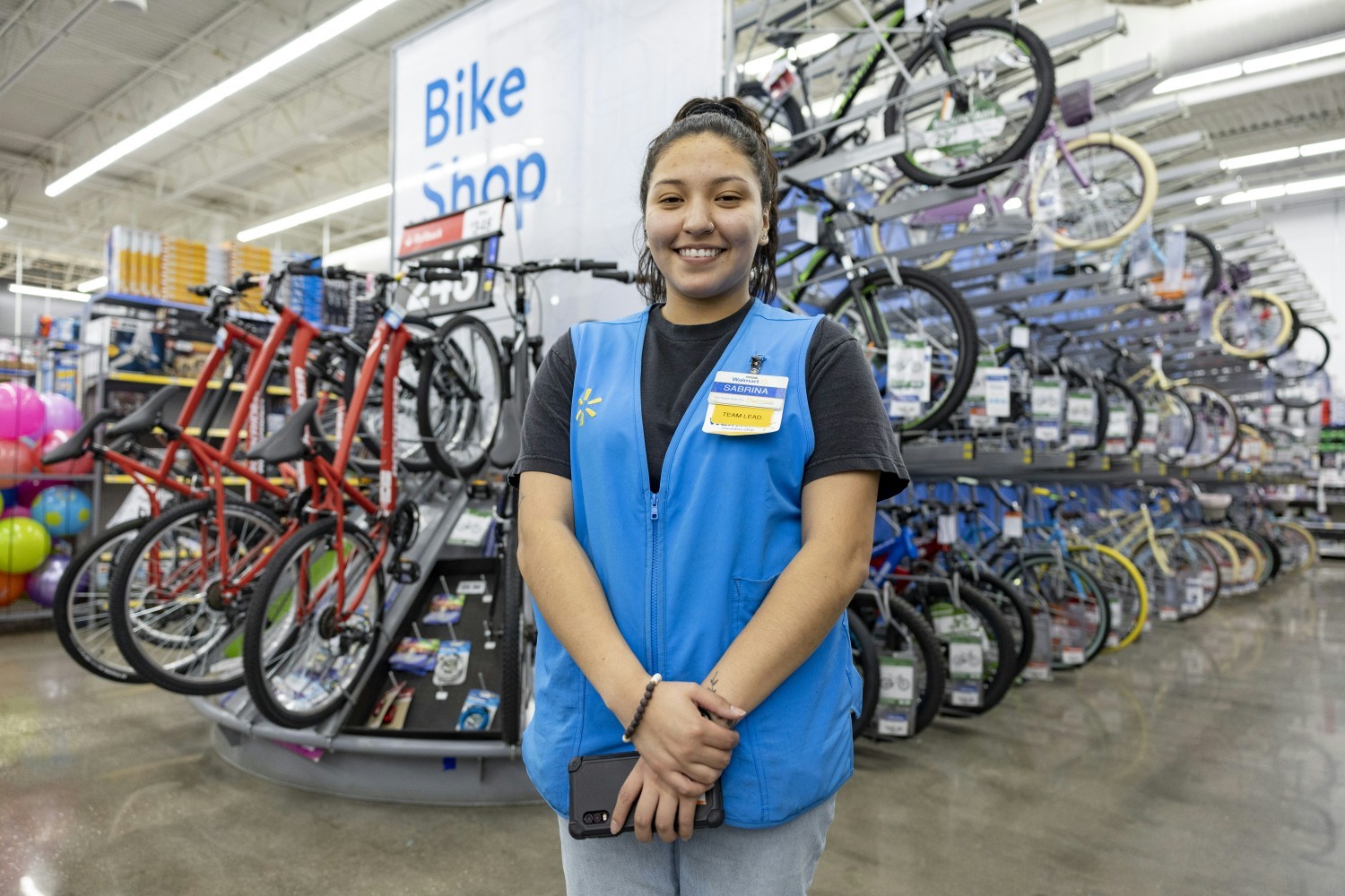 Walmart associate in the bike shop