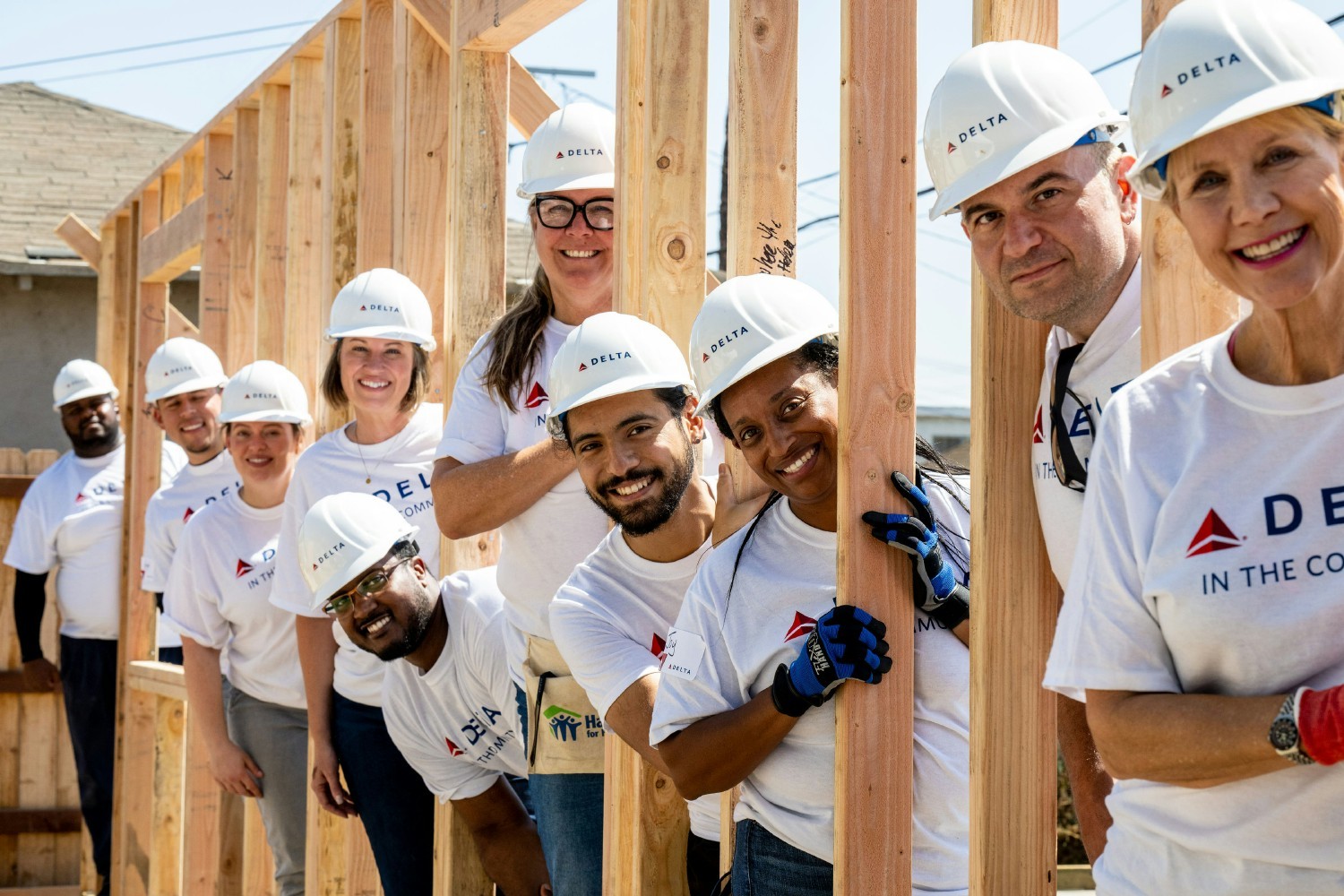 Employees volunteer their time and talent with Habitat for Humanity to build homes in the communities we serve.