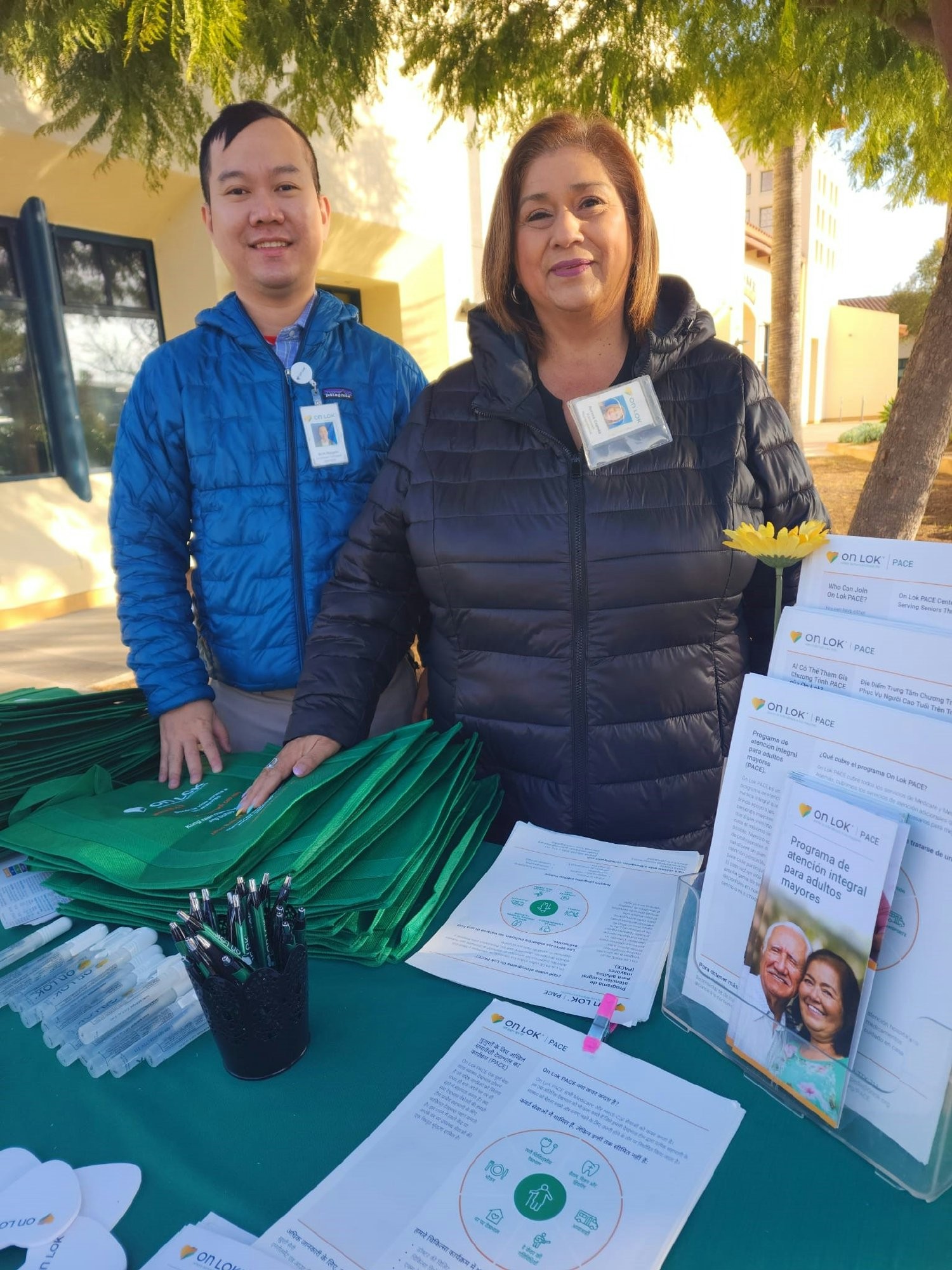 On Lok Enrollment team tabling at a community event.