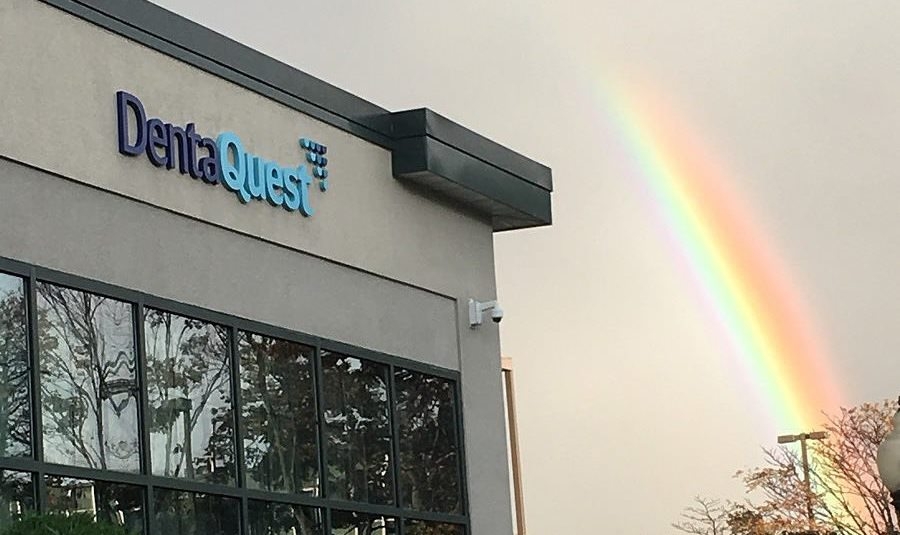 A rainbow shines over the DentaQuest Office Building