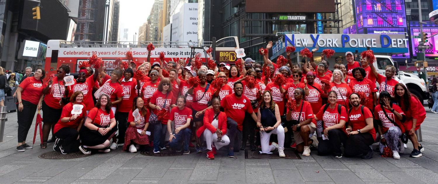 Times Square lit up as AARP staff marked 90 years of Social Security and its promise for the future.