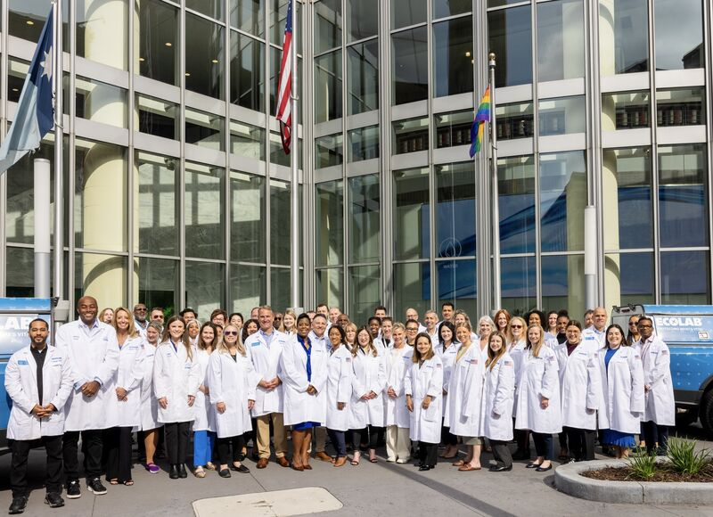 Ecolab associates in iconic lab coats host the Multicultural Foodservice & Hospitality Alliance Roundtable.