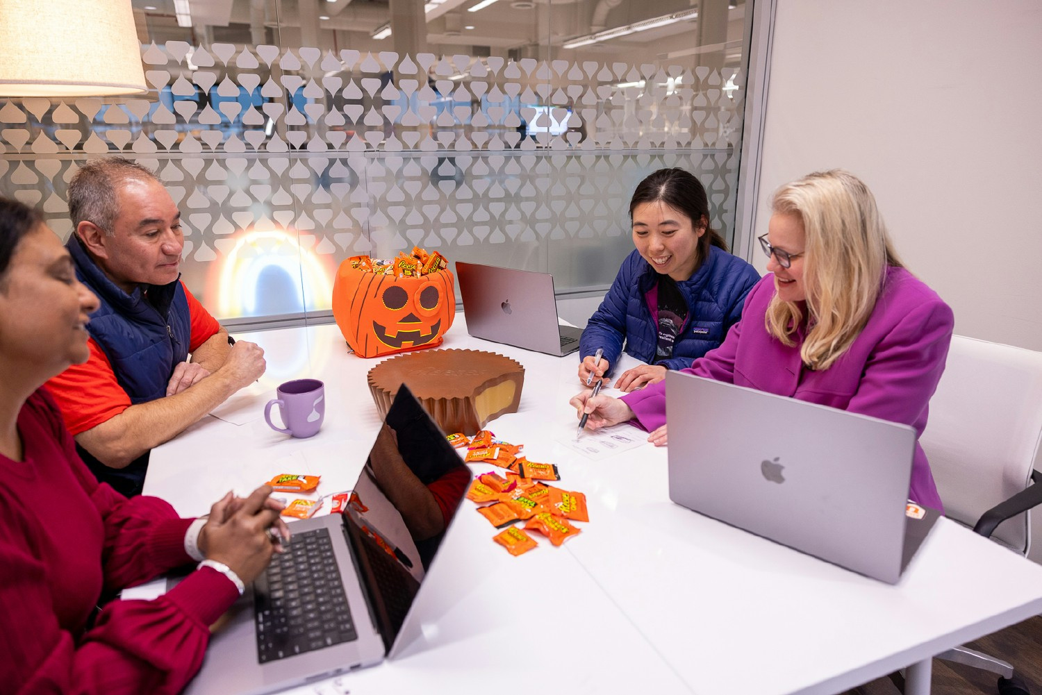 Employees teaming at the corporate office