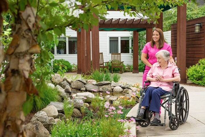 Resident and Nursing staff enjoy the outdoor space in the Meadows.