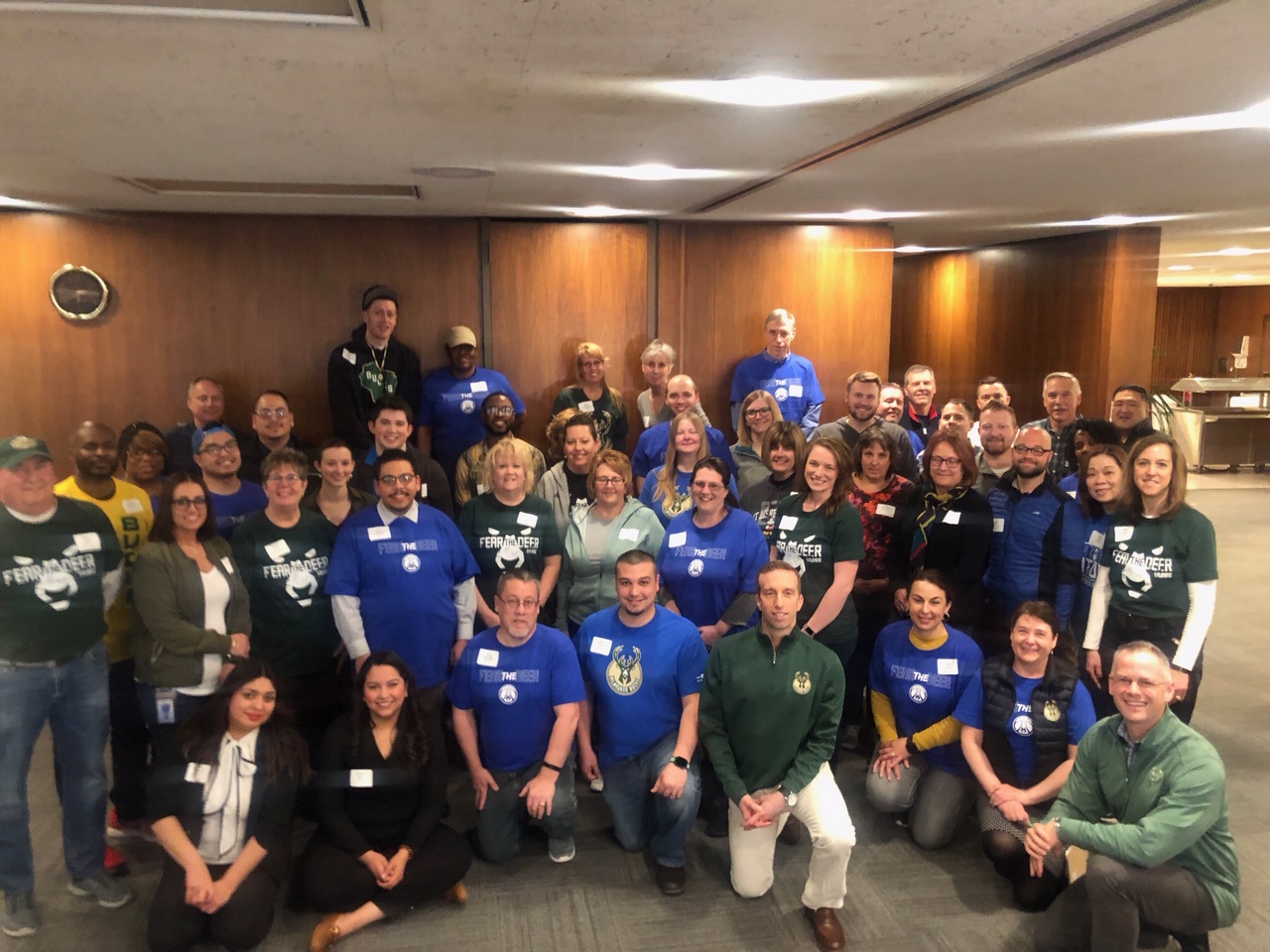 BMO employees volunteer to create 18-story display that hung in the widows of 770 North Water Street building in Milwaukee in support of Milwaukee Bucks Play-off season.