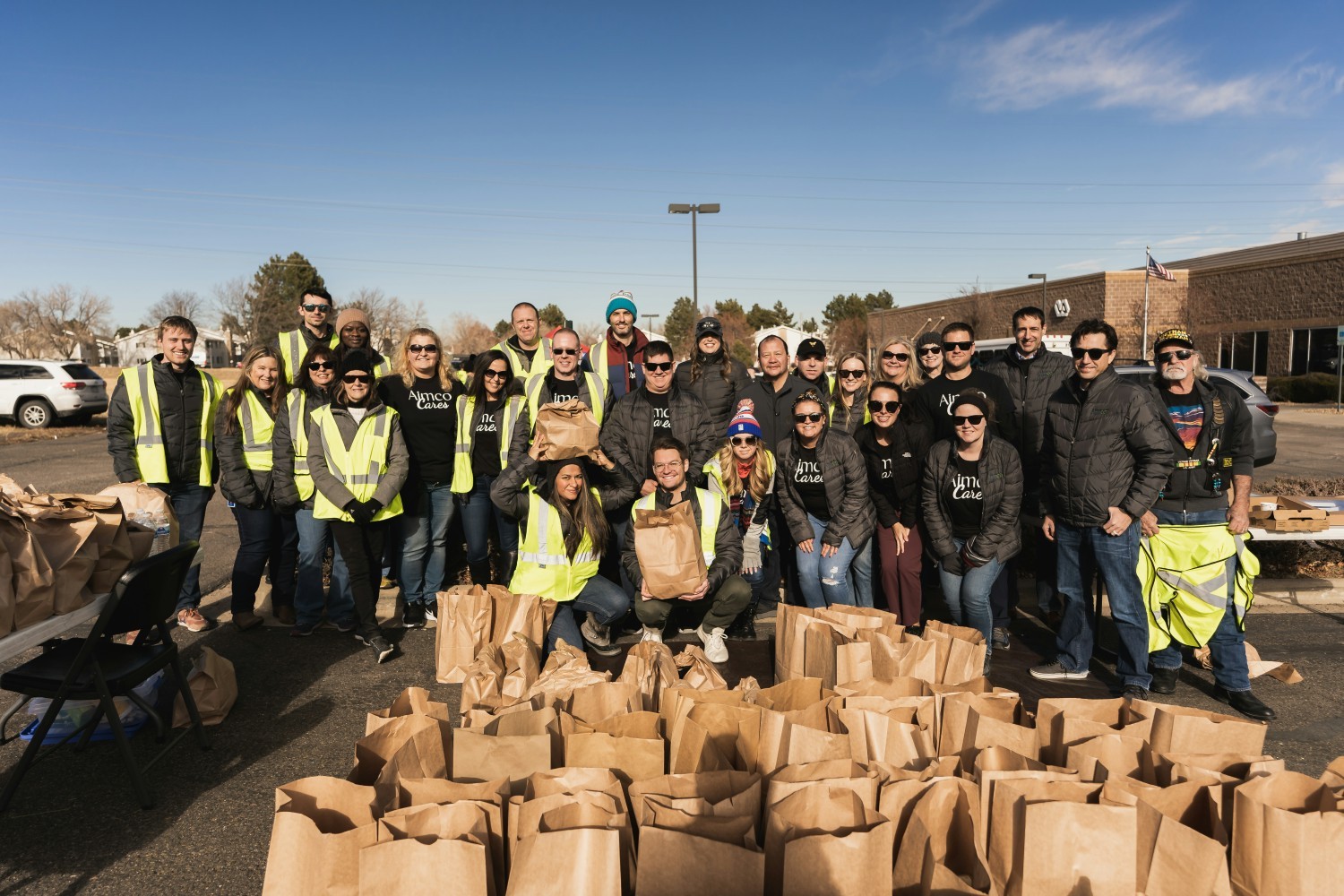 The Aimco team volunteering for Aimco Cares with Soldiers' Angels Mobile Food Drive in Aurora, CO. 