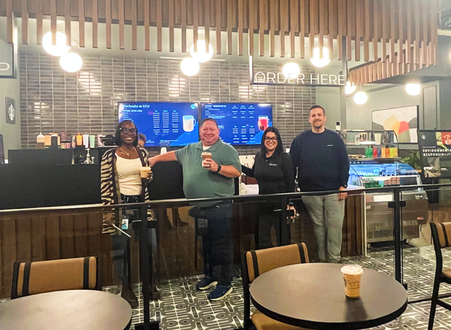 Team members enjoying the on-site Starbucks at CCU's corporate headquarters in Lake Forest, IL.