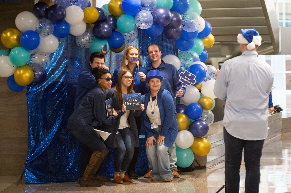 Employees gather across ERIE’s 12-state footprint for Happy Blue Year, ERIE’s annual year-end celebration.