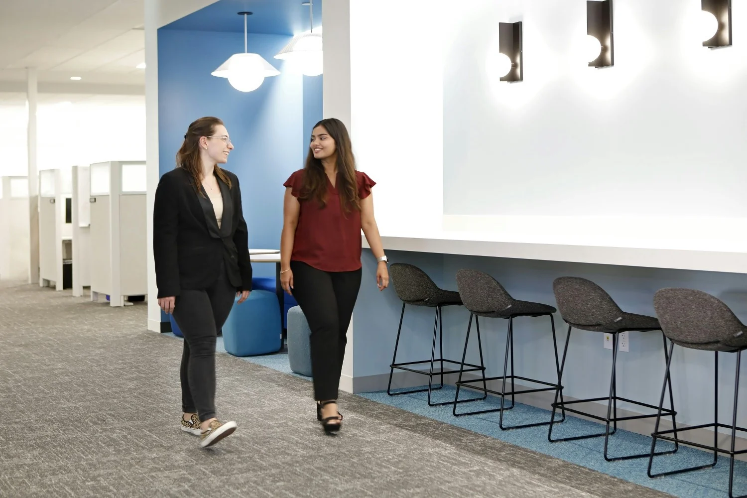 Cadence HQ employees spending time catching up. 