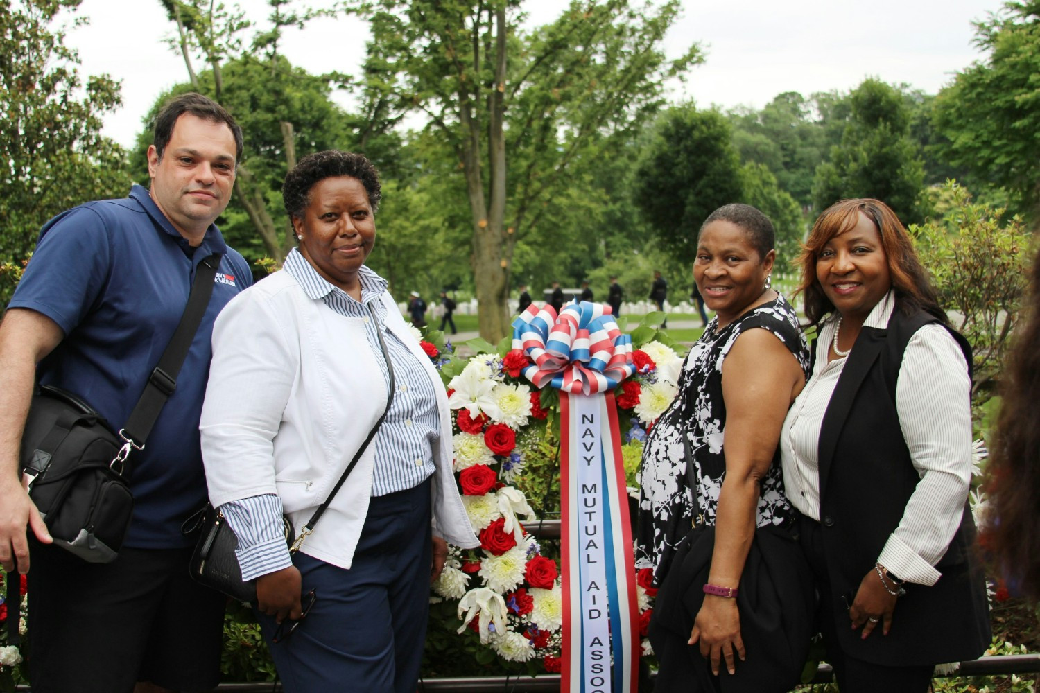 Navy Mutual staff volunteer to participate in the Memorial Day Wreath Laying at Arlington National Cemetery.