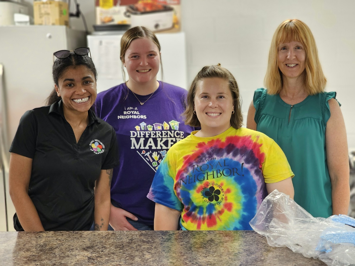Team members had smiles for miles as they provided nourishment to community members in need.
