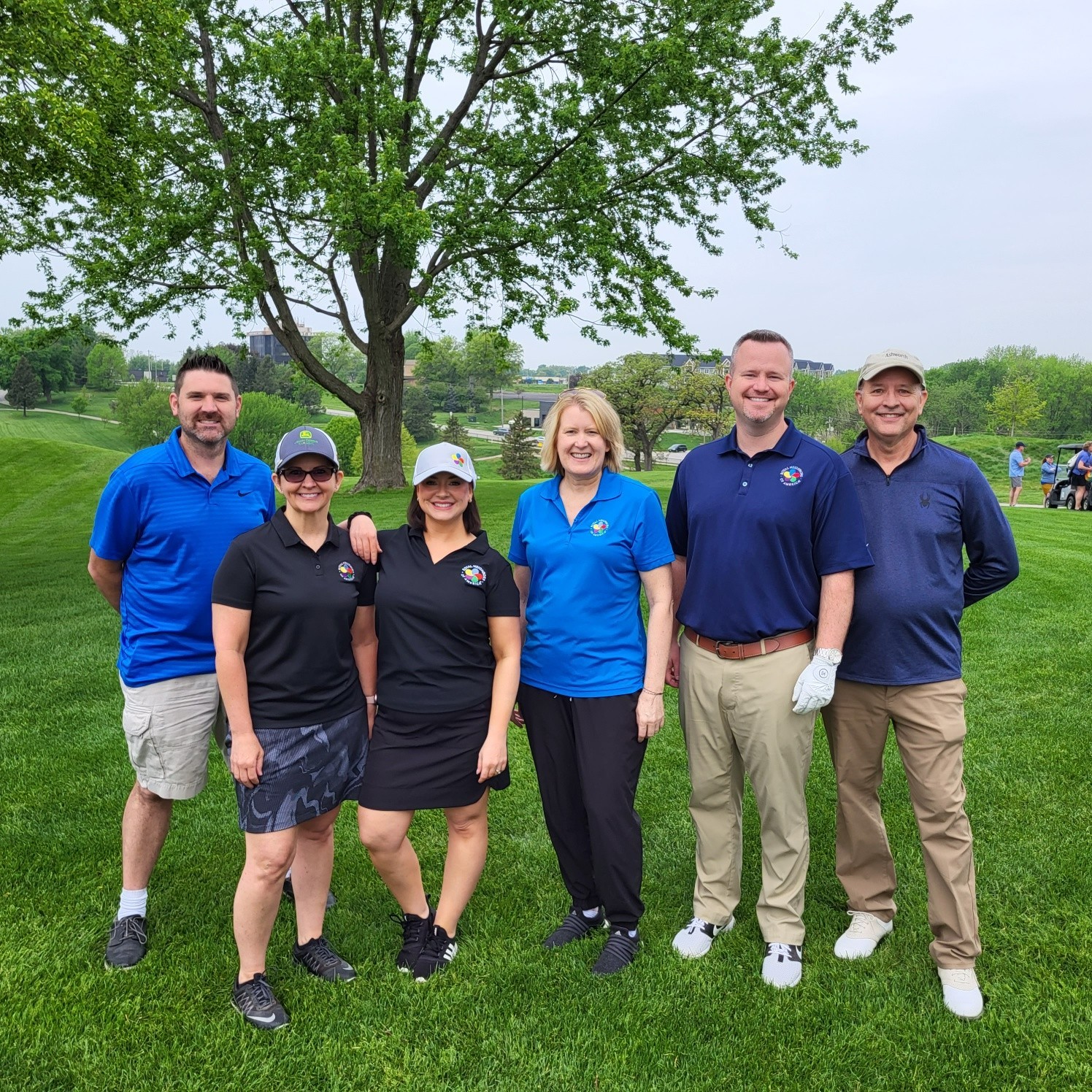 Leaders took a break from the office and hit the links for a charity golf event.