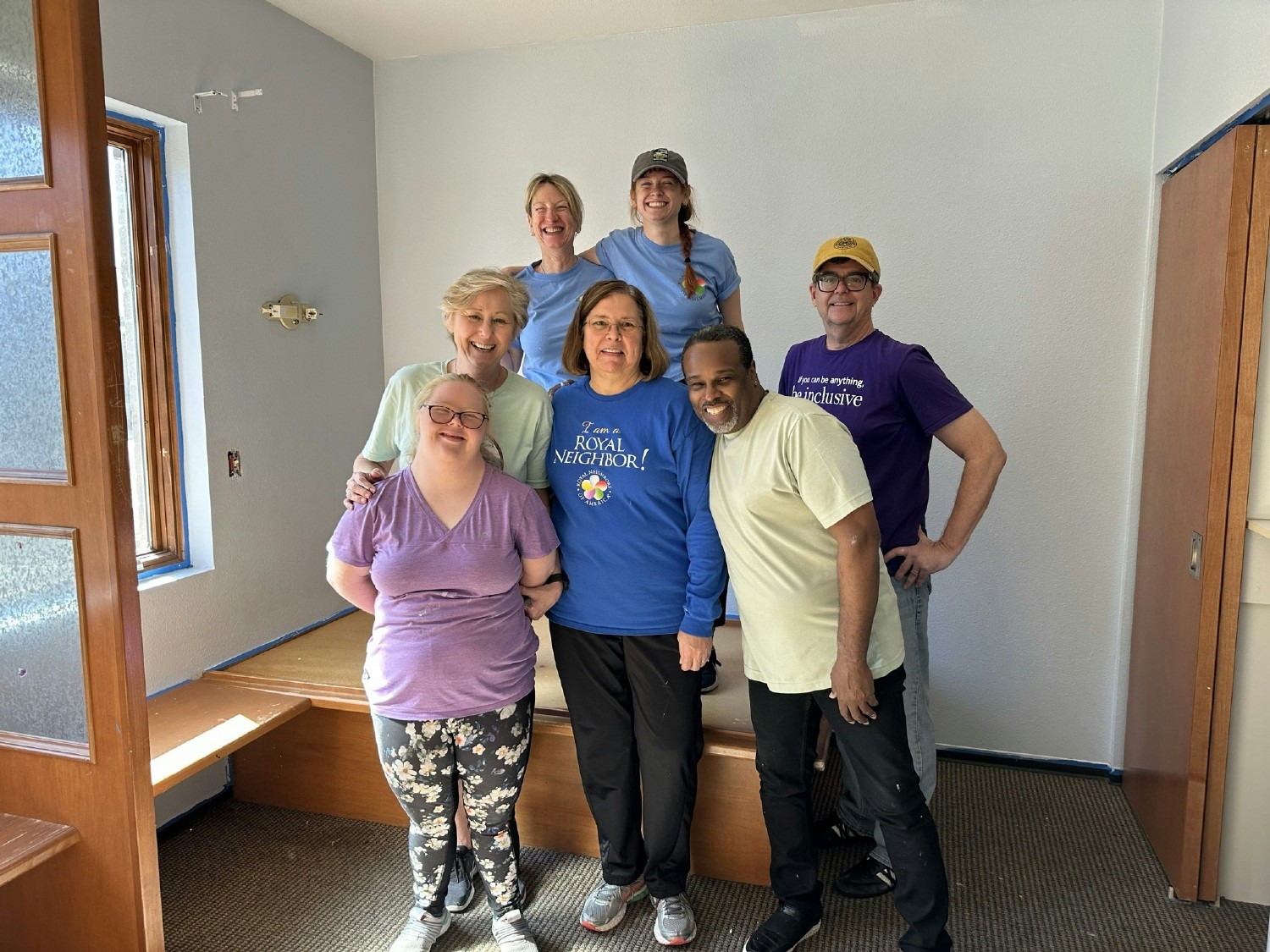 Team members took a break from their volunteer project to pose for the camera. Volunteering makes us smile!