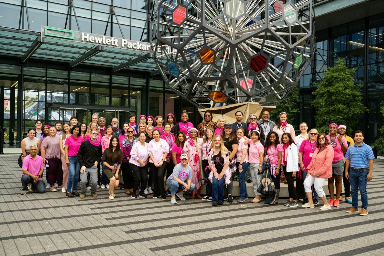 Houston area team members after completing a Breast Cancer Awareness walk around HPE's Houston campus.