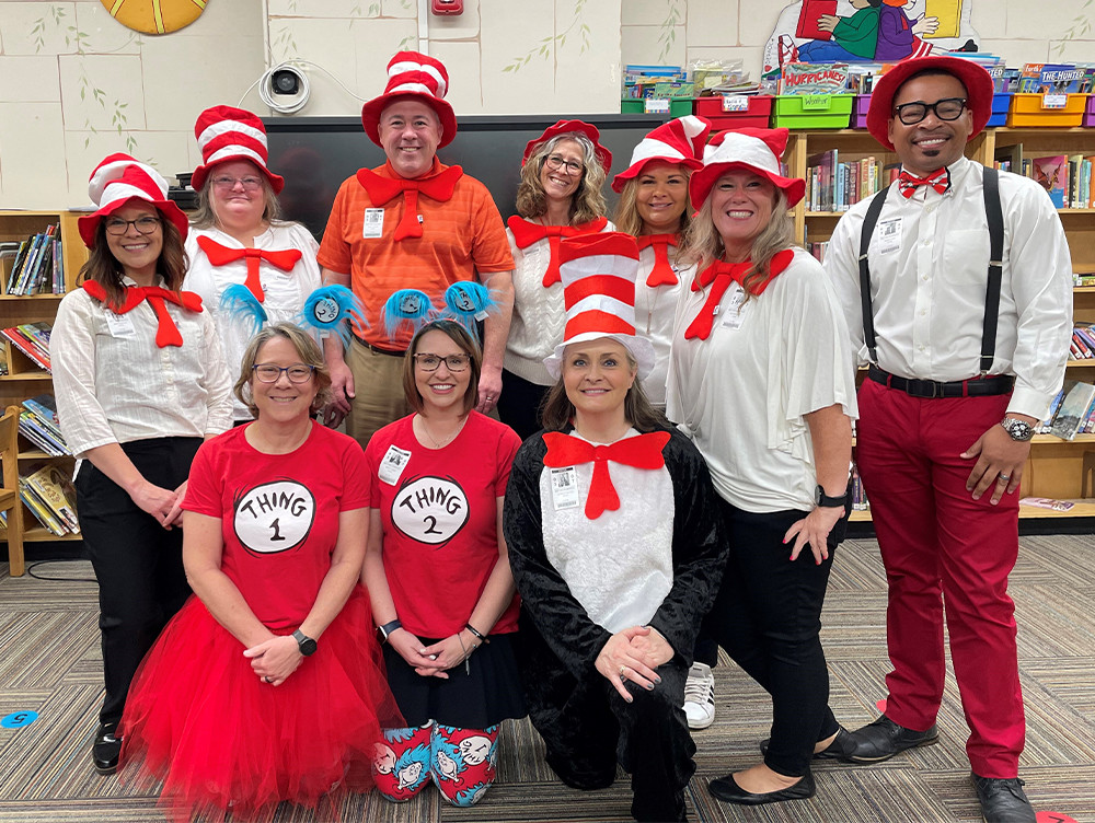Pinnacle associates go all out to make Read Across America Day fun and engaging for public school students.