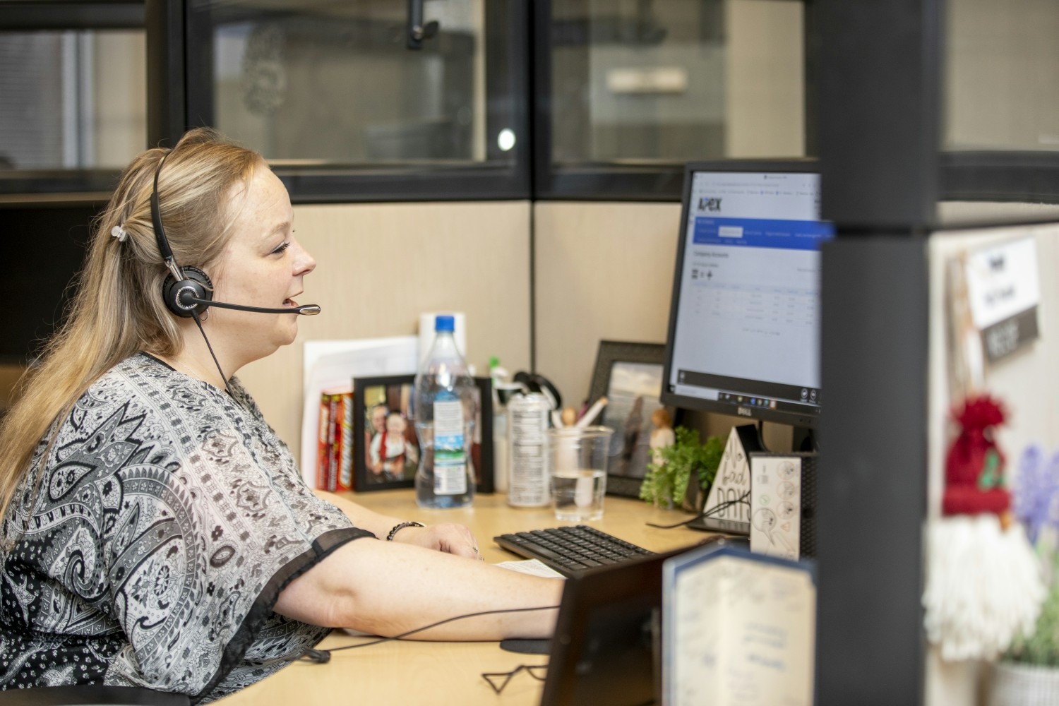 Pinnacle only hires associates who have hearts to serve, like this associate in the firm's client service center.