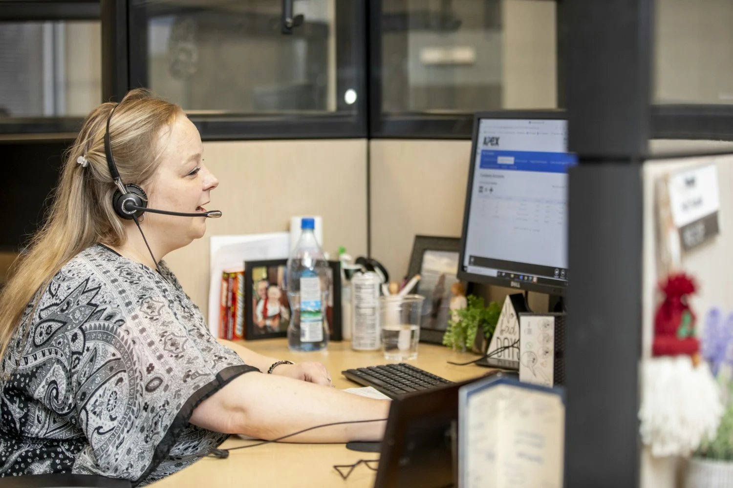 Pinnacle only hires associates who have hearts to serve, like this associate in the firm's client service center.