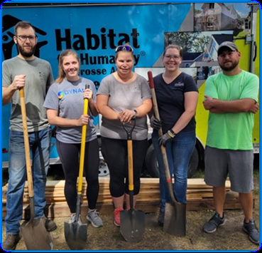The Dynamic Difference committee poses after volunteering with Habitat for Humanity. 