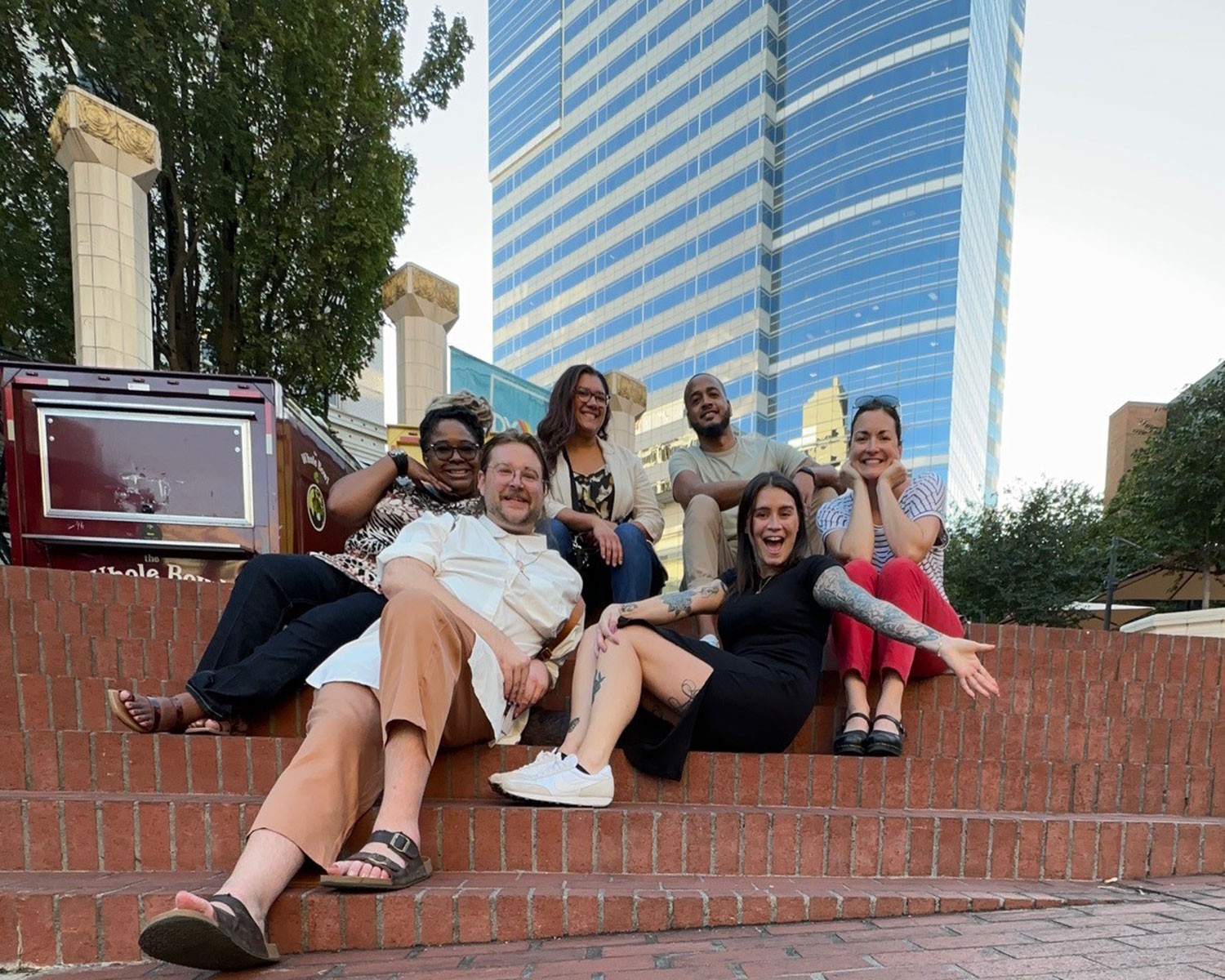 Rubys pose for a photo opp outside our corporate headquarters while racing on a team scavenger hunt. 