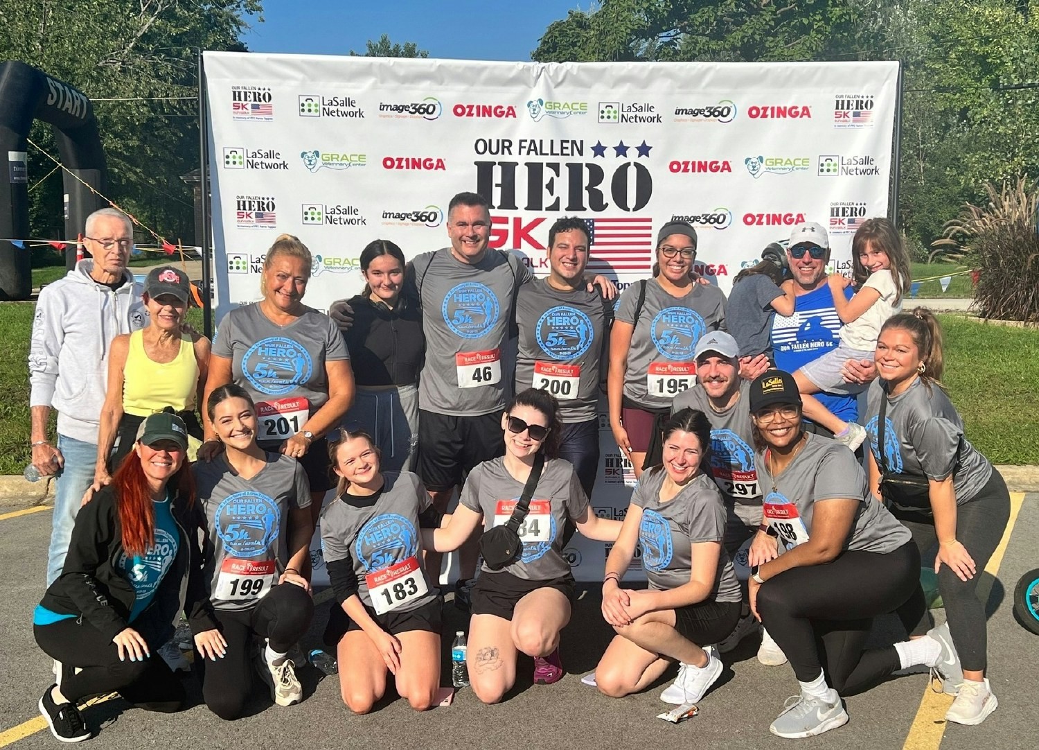 LaSallians running and volunteering at the Our Fallen Hero 5K, an event we've sponsored for 6+ years