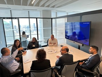 Moody's employees collaborate with colleagues both in person and remove via new space for hosting hybrid meetings.