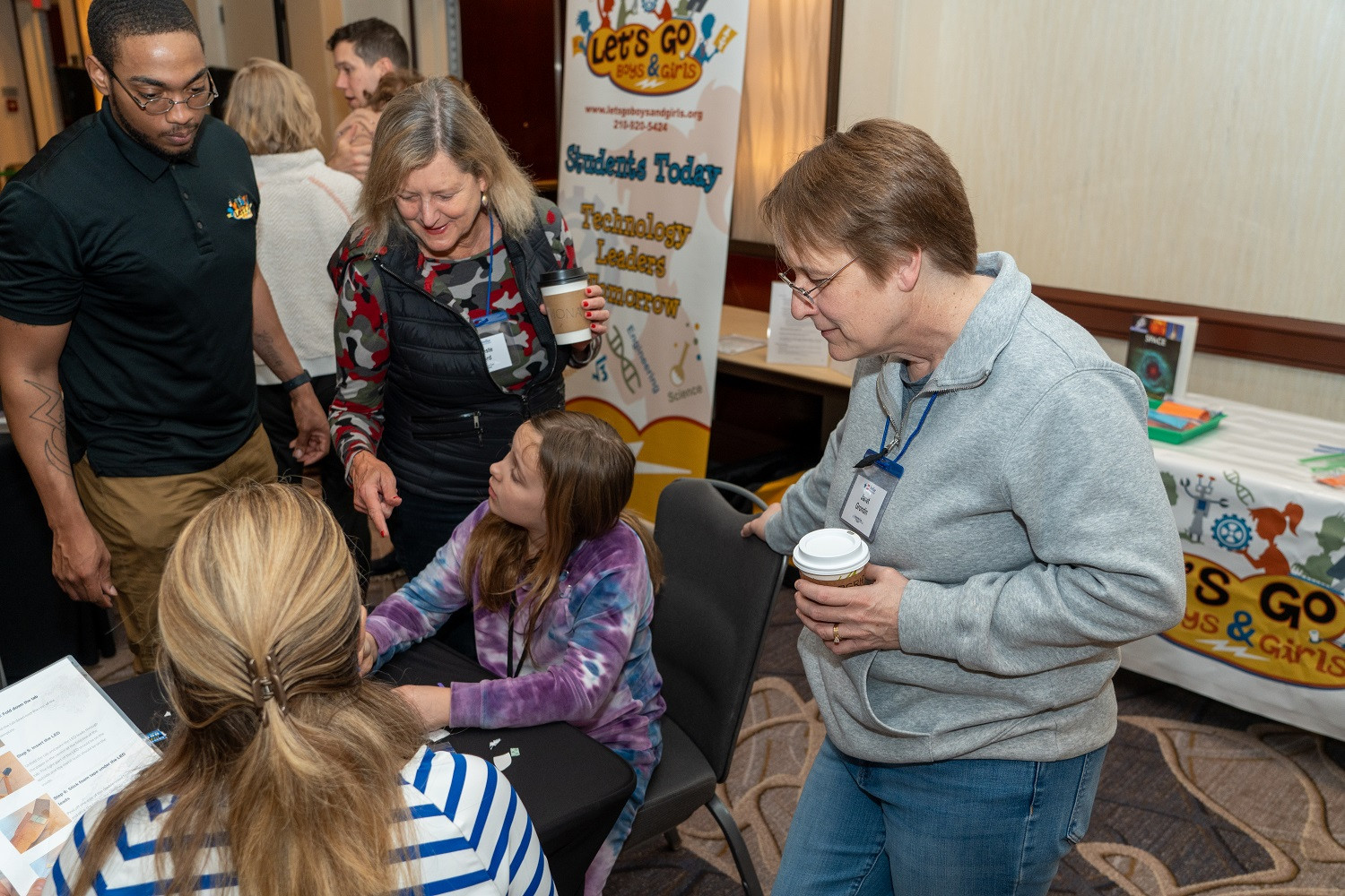 Founder Celeste Ford and CEO Janet Grondin host employee families for STEM community service and team building