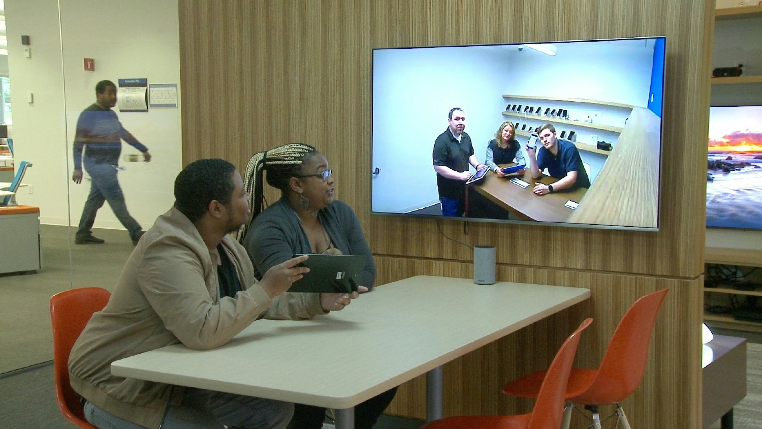 Tech Center employees using technology to communicate