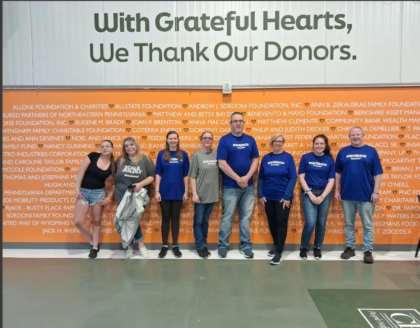 Benco Community Boosters volunteer at CEO Weinberg Food Bank