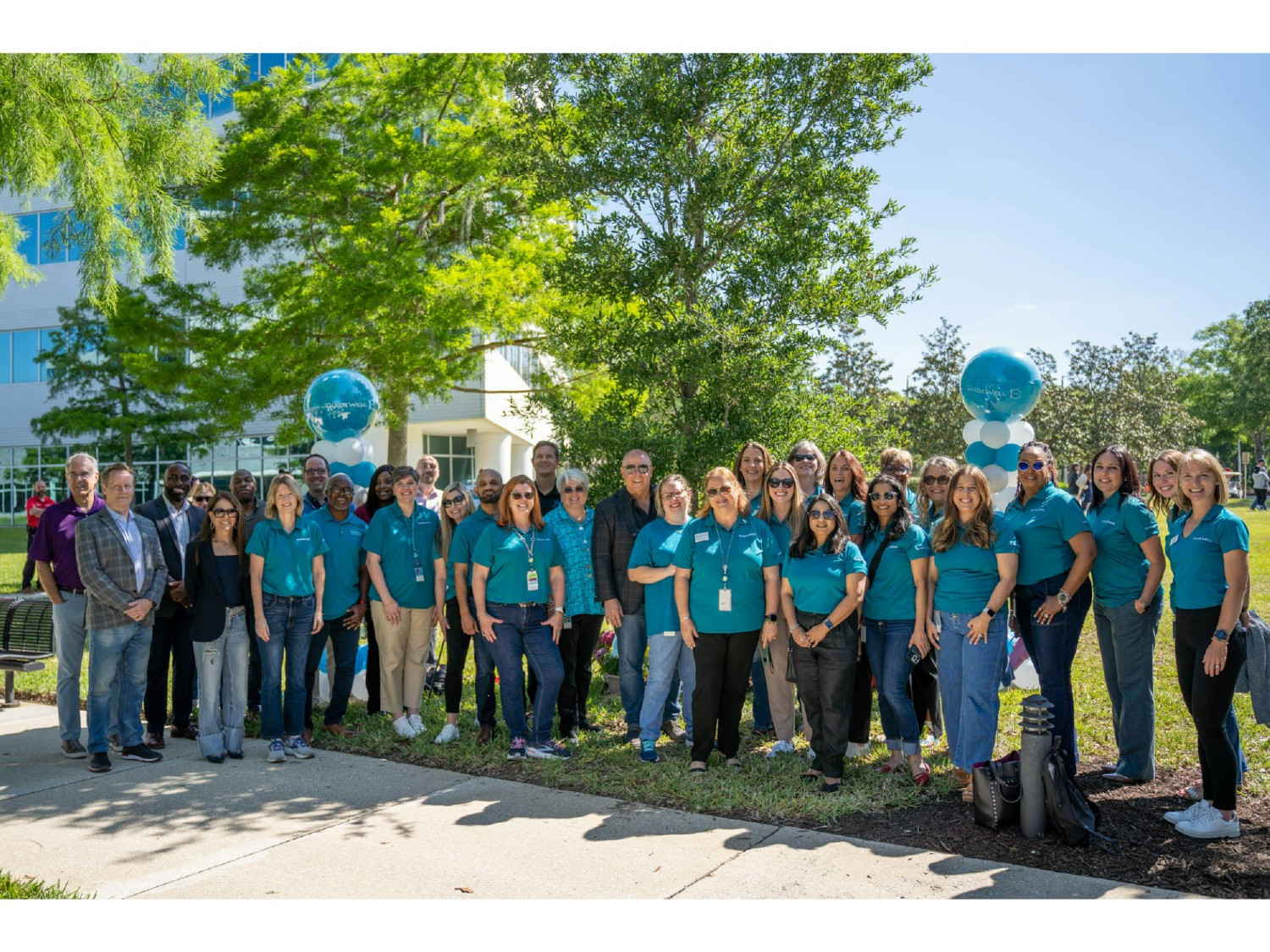 The Values Council joined by executive team for the Values Tree rededication during 2024 Employee Appreciation Day event