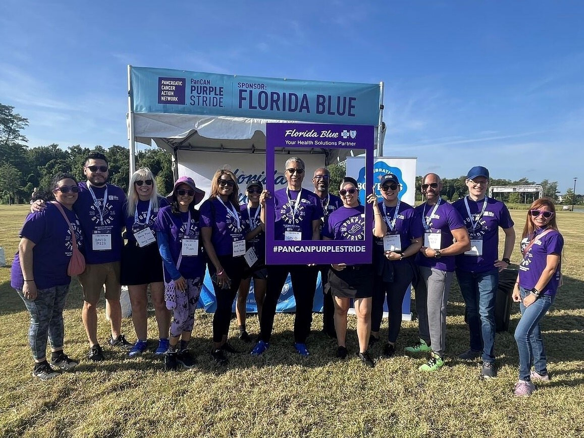 Florida Blue team members walk in honor of Dave Pizzo at Pancreatic Cancer Action Network's Purple Stride