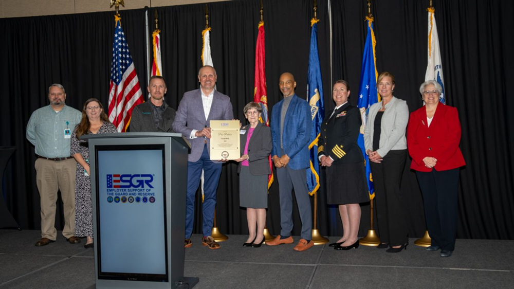 GuideWell leaders accepting the Pro Patria Award honoring our support for military‑connected colleagues and families